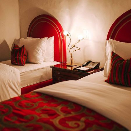 โรงแรมเดอ ลา ซิกอญ เจนีวา ห้อง รูปภาพ A room at the hotel