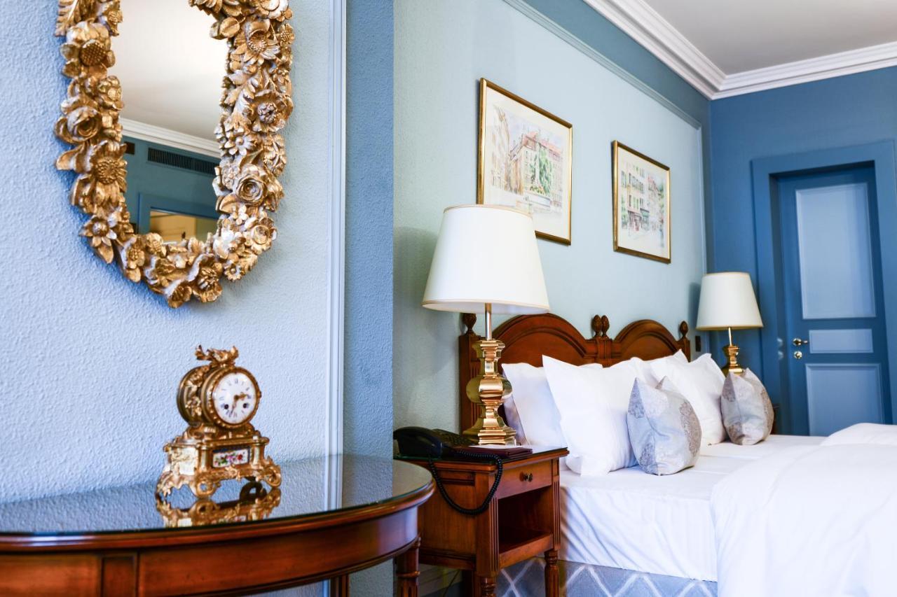 โรงแรมเดอ ลา ซิกอญ เจนีวา ภายนอก รูปภาพ A bedroom at the hotel