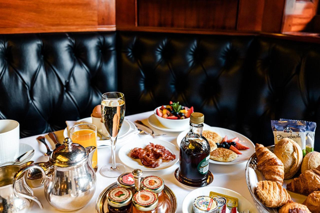 โรงแรมเดอ ลา ซิกอญ เจนีวา ภายนอก รูปภาพ A typical breakfast at the Oyster Bar