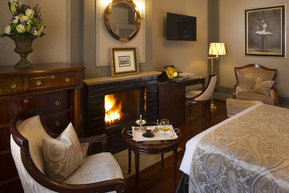 โรงแรมเดอ ลา ซิกอญ เจนีวา ภายนอก รูปภาพ A bedroom at the hotel