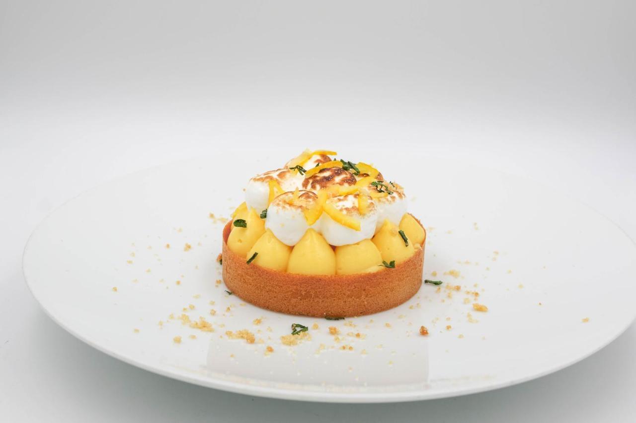 โรงแรมเดอ ลา ซิกอญ เจนีวา ภายนอก รูปภาพ A lemon tart