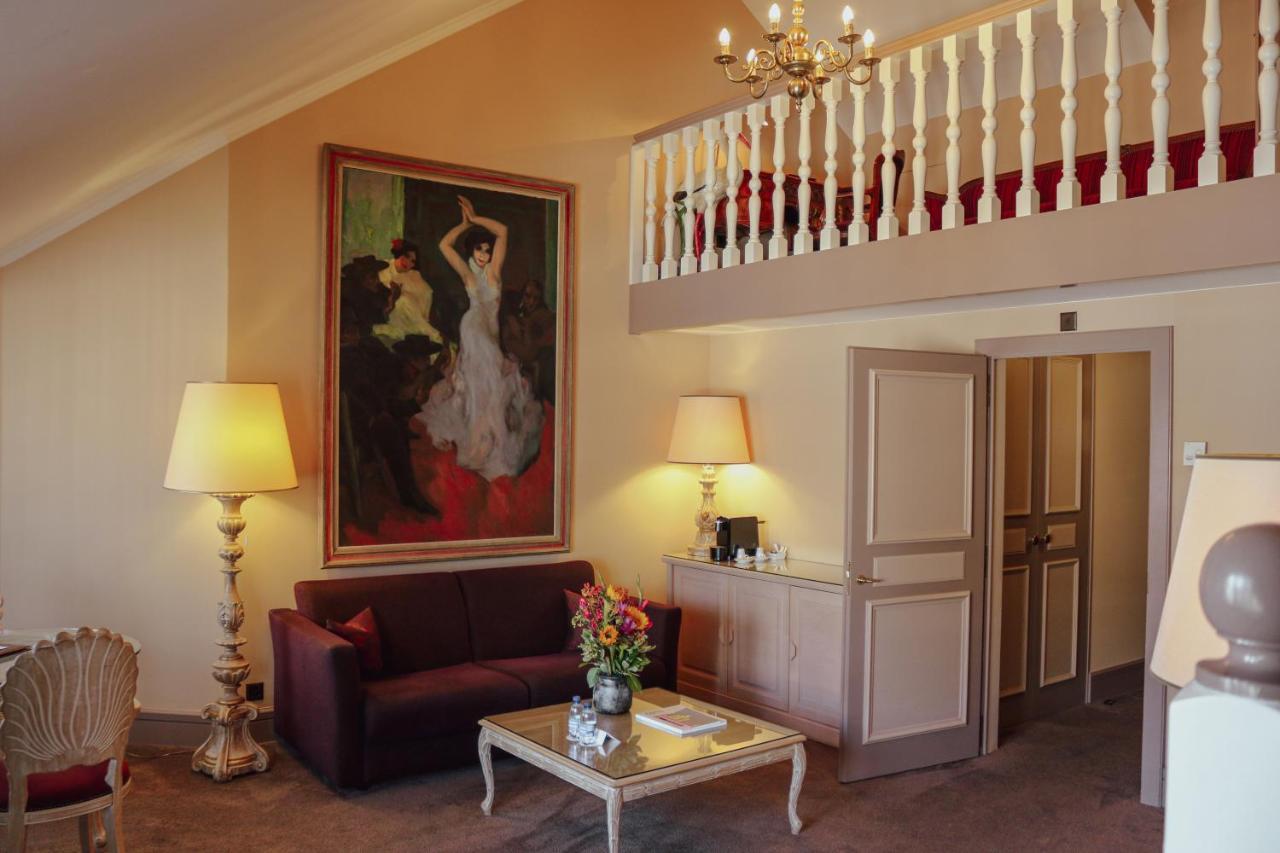 โรงแรมเดอ ลา ซิกอญ เจนีวา ภายนอก รูปภาพ A suite at the Hotel de l'Europe
