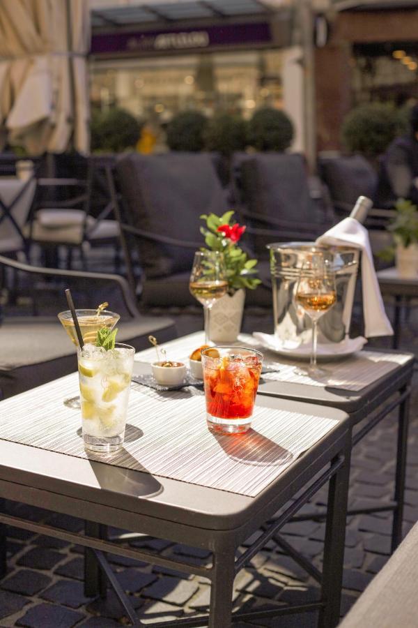โรงแรมเดอ ลา ซิกอญ เจนีวา ภายนอก รูปภาพ Cocktails at the hotel