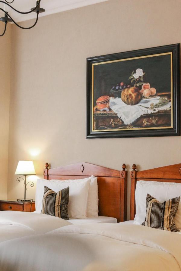 โรงแรมเดอ ลา ซิกอญ เจนีวา ภายนอก รูปภาพ A room at the hotel