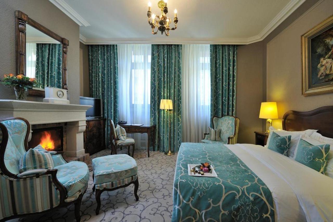 โรงแรมเดอ ลา ซิกอญ เจนีวา ภายนอก รูปภาพ A room at the hotel