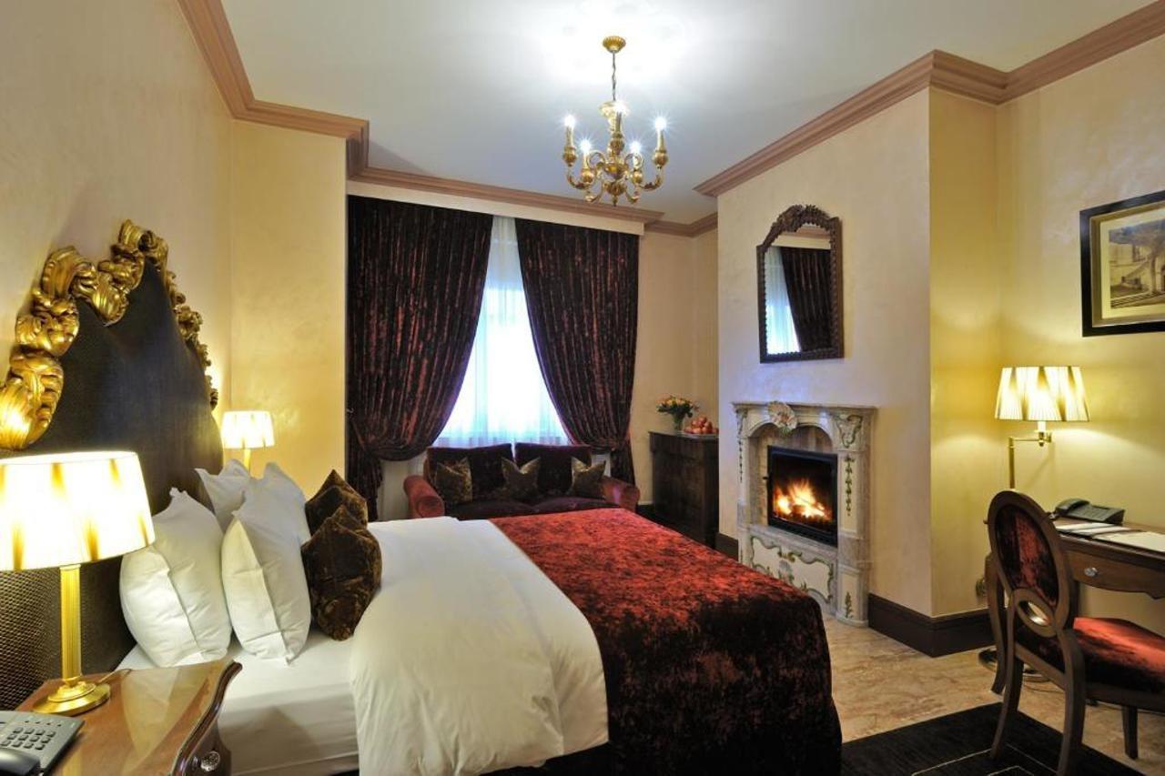 โรงแรมเดอ ลา ซิกอญ เจนีวา ภายนอก รูปภาพ A room at the hotel