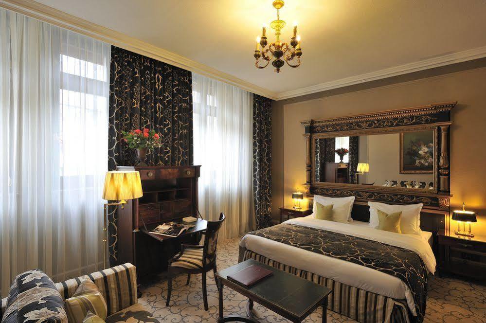 โรงแรมเดอ ลา ซิกอญ เจนีวา ภายนอก รูปภาพ A room at the hotel
