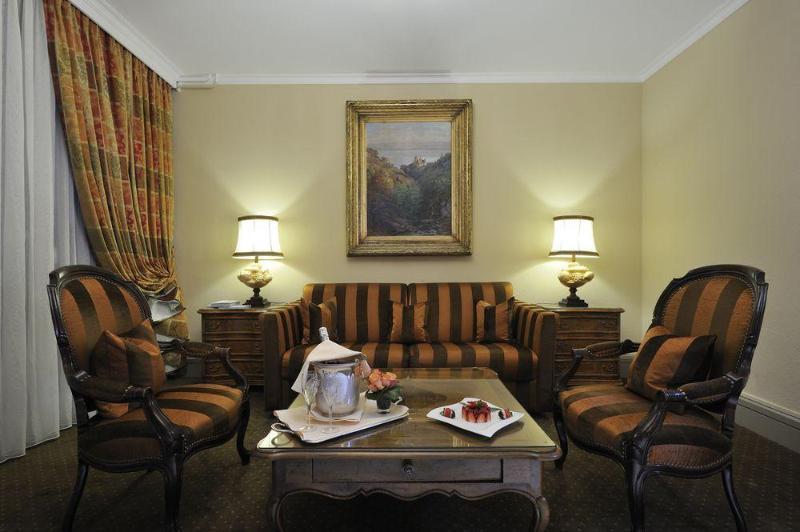 โรงแรมเดอ ลา ซิกอญ เจนีวา ภายนอก รูปภาพ A living room at the hotel
